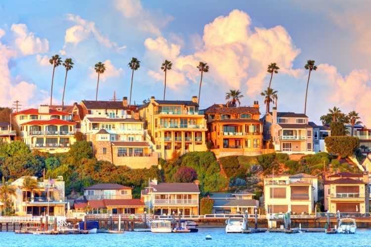 Newport Beach waterfront homes and boats at sunset — Tristar Investigation, Private Investigator Newport Beach
