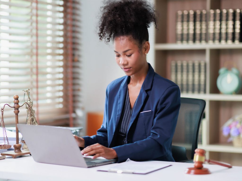 Attorney reviewing legal records as part of a civil litigation due diligence investigation