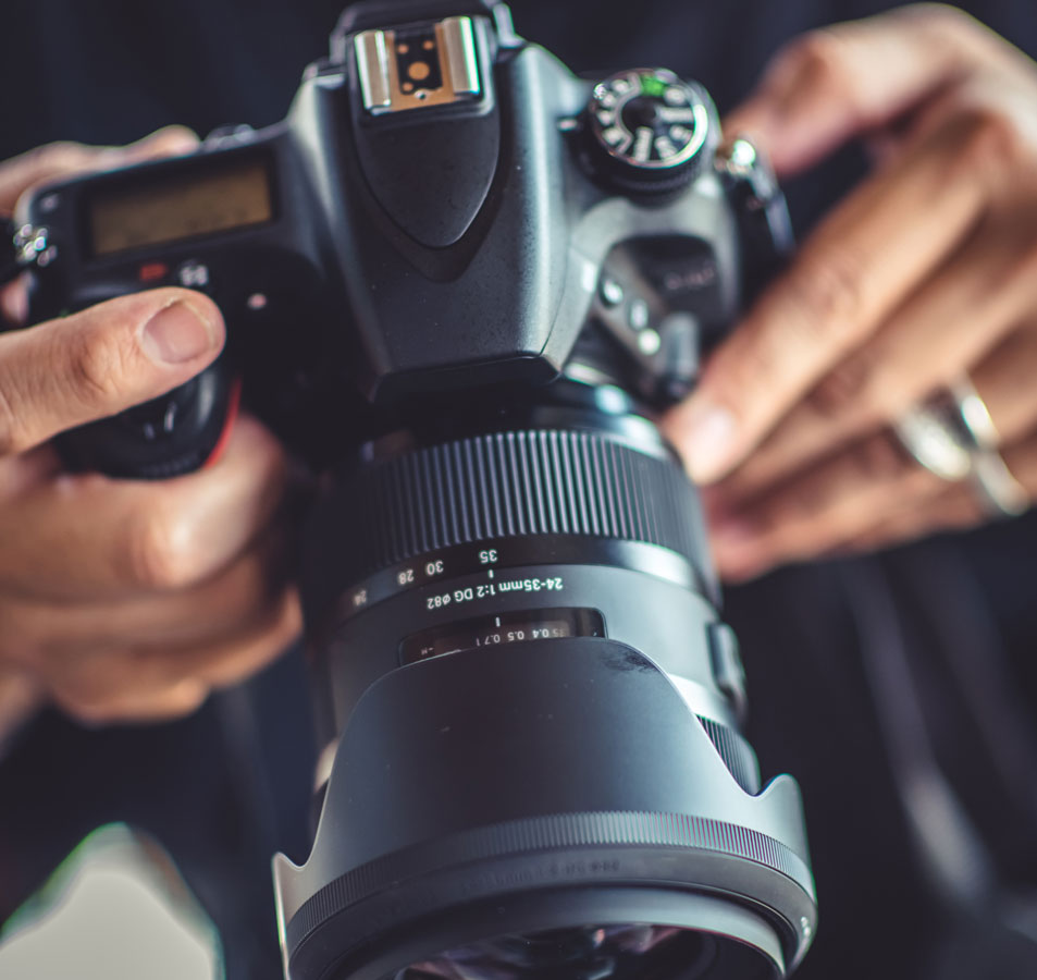 Professional camera equipment used during surveillance in support of attorney investigations.